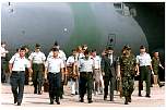 a group of army and airforce personnel walking