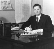John Sparkman at his desk