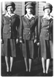 photo of 3 female employees wearing the first uniforms for the women employees of Redstone Ordnance Plant
