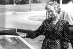 woman looking at BJ Fox dedication plaque
