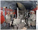 soldiers in plane cabin with lance missile