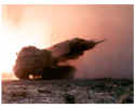 MLRS launcher firing missile