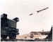Photo of an Avenger Air Defense System firing the British made starstreak missile.  The Avenger is a surface-to-air missile and gun weapon system mounted on a high mobility multipurpose wheeled vehicle.