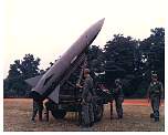 soldier gathered around a LANCE missile