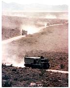 truck convoy through the desert