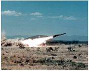 hawk missile in flight over a desert