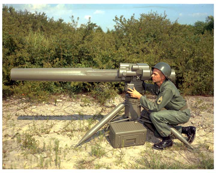 Photo of an Army staff sergeant sighting in a ground mounted TOW missile.