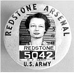 Female employee wearing WW2 Redstone arsenal badge